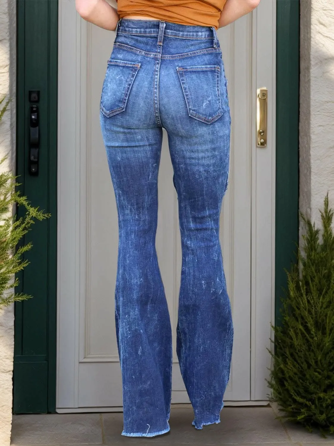 Edgy bootcut jeans with raw hem